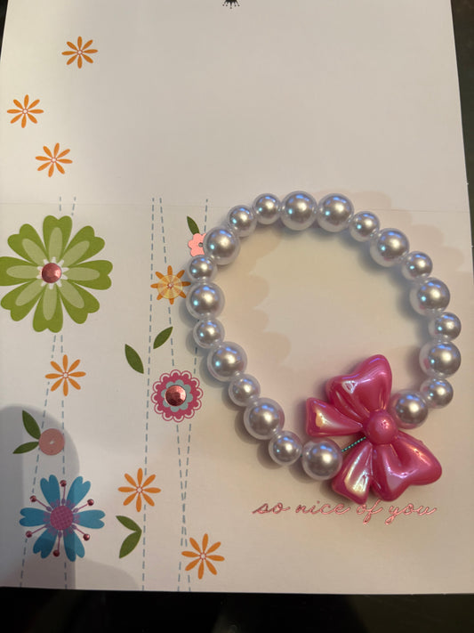 Pearl and bow bracelet